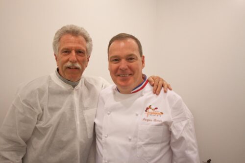 Chef Jacques Torres and Battman pose for a picture. Photo by Kara Chin.