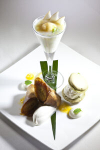 Asian Trio by Michael Mignano, Executive Pastry Chef. Coconut & Honeydew "Sago-tini", Banana Spring Rolls with Saki Cream, Sesame Brittle Ice Cream Sandiwich and Matcha Macarons