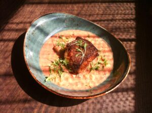Coriander Cumin-Crusted Tilefish with peanut gazpacho. Chef JJ Johnson's dish for Battman's next book: Crossing Borders