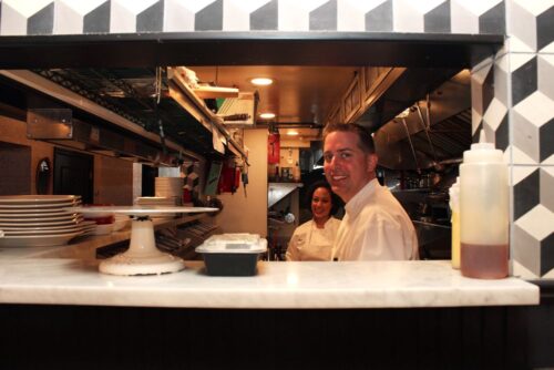 Chef Ed Cotton and Sous Chef Patricia Vega at work in the kitchen.
