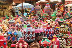 Image of baskets being sold at an outdoor market.