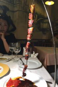 Evaluating a skewered tentacle. Photo by Battman. 2017