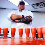 Chris Richter shows off his tattoos.