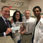 Battman with Burn Center staff.