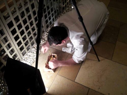 Chef Damian Sansonetti prepares his dish for the Street Eats book. Photo by Battman.
