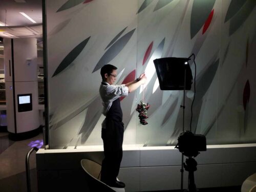 Chef Doron Wong preparing his dish for the Street Eats book. Photo by Battman.