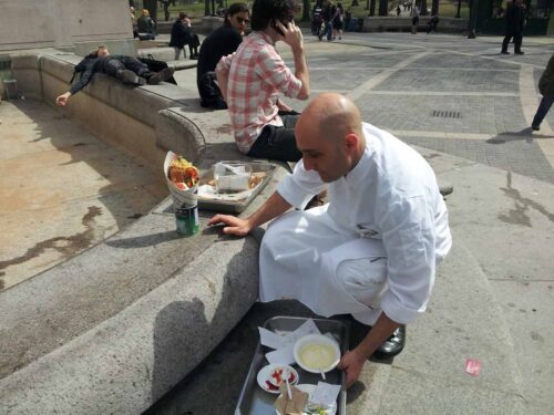 Chef Greg Brainin preparing his dish for the Street Eats book. Photo by Battman.