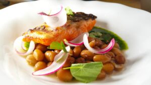 Grilled Arctic Char, Maxafax, Arugu and Pesto by Chef Suzanne Cupps. Photo by Battman.