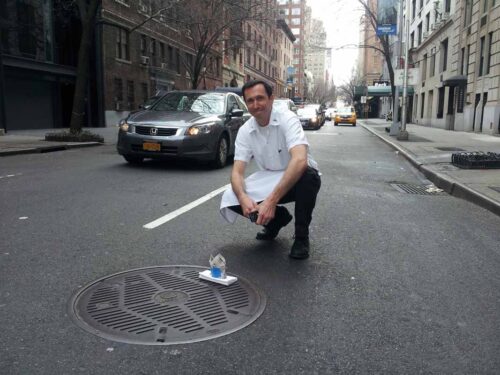 Chef Richard Leach preparing his dish for the Street Eats book. Photo by Battman.