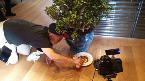 Eric Kwan assembling his dish for photo shoot with Battman.